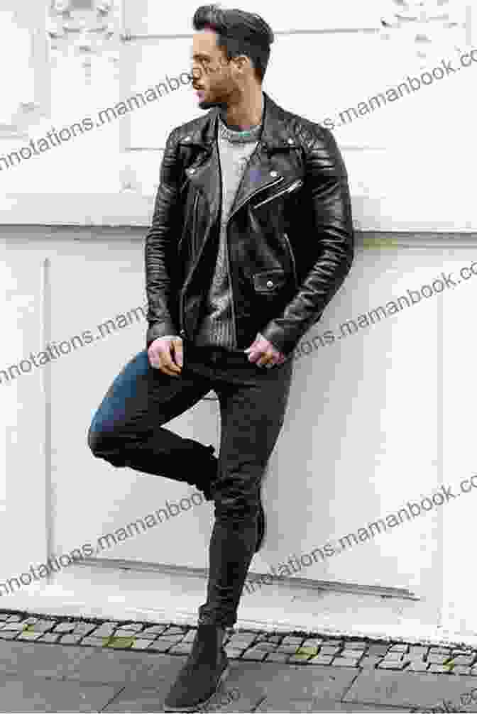 A Man Wearing A Black Leather Jacket With A Pair Of Black Jeans. Boyfriend Sweaters: 19 Designs For Him That You Ll Want To Wear